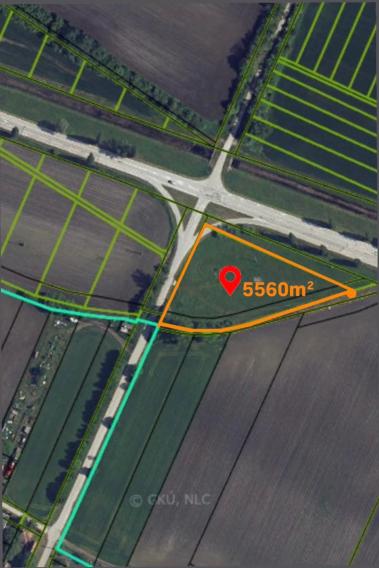 Stavebný pozemok 5560 m2 v obci Kravany nad Dunajom , okr. Komárno